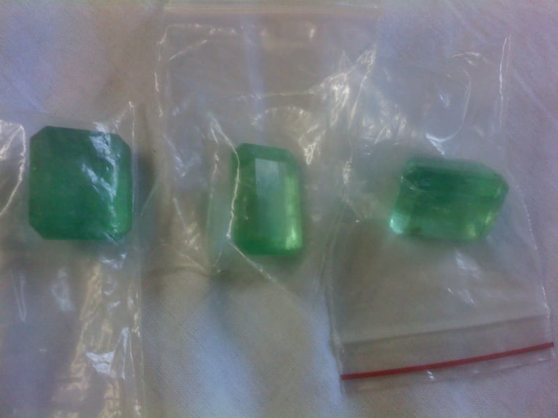 3.10 carat natural Zambian emerald, emerald cut, viewed table-up under daylight